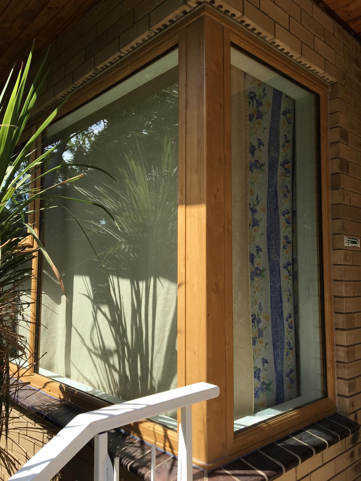 Glazed door with leadlight sidelight panel