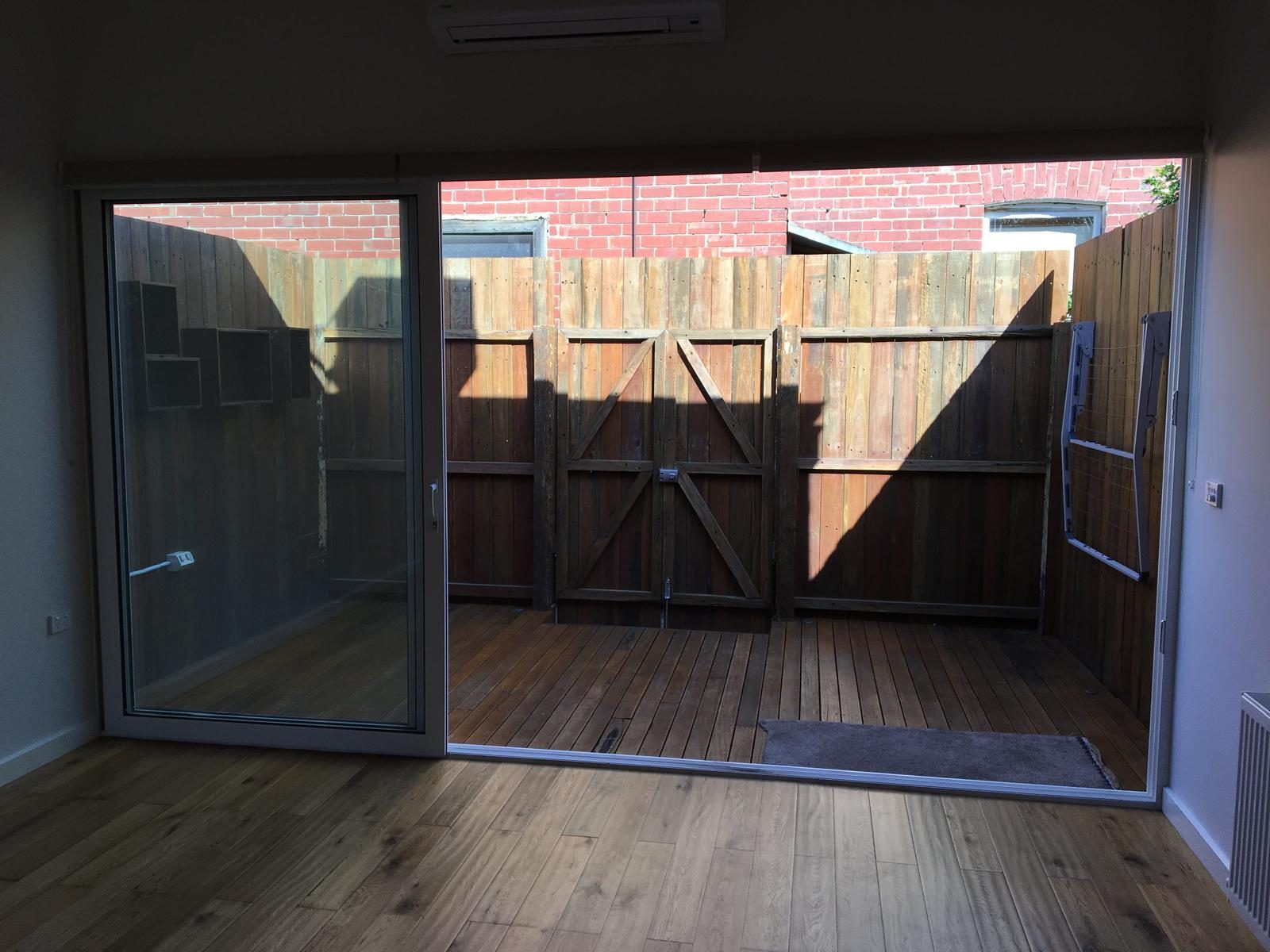 Sliding doors onto a timber deck