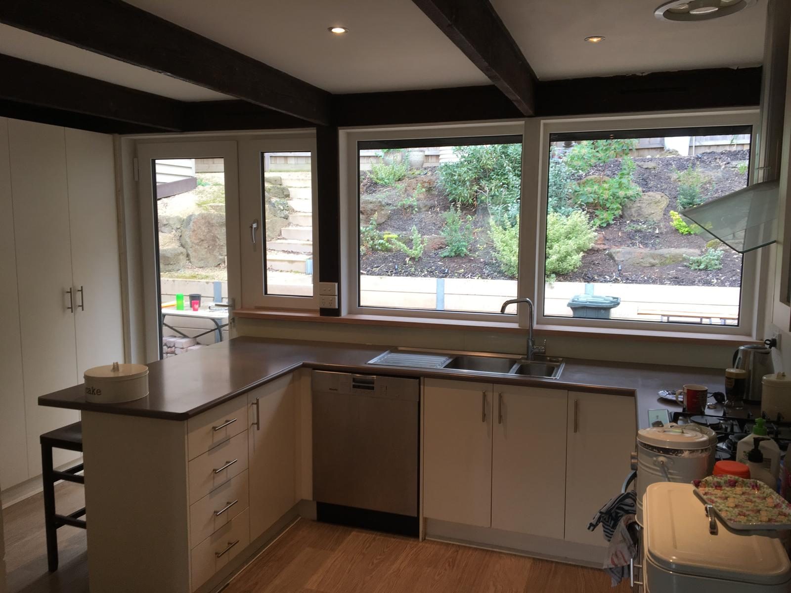 Corner kitchen glazing with garden outlook