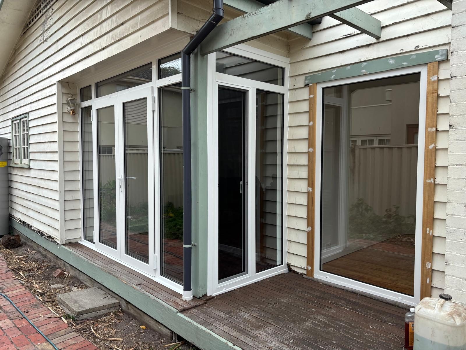 White double glazed window on a rendered wall