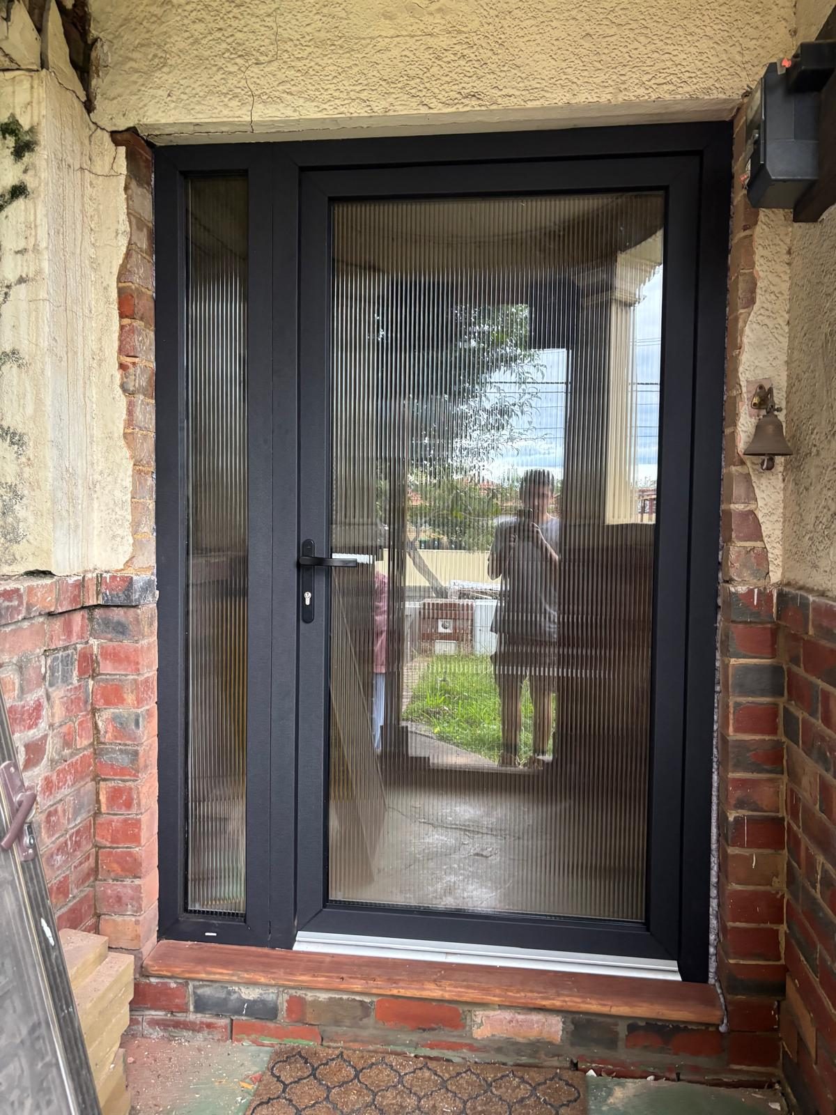 Charcoal uPVC entry door with full height glazing