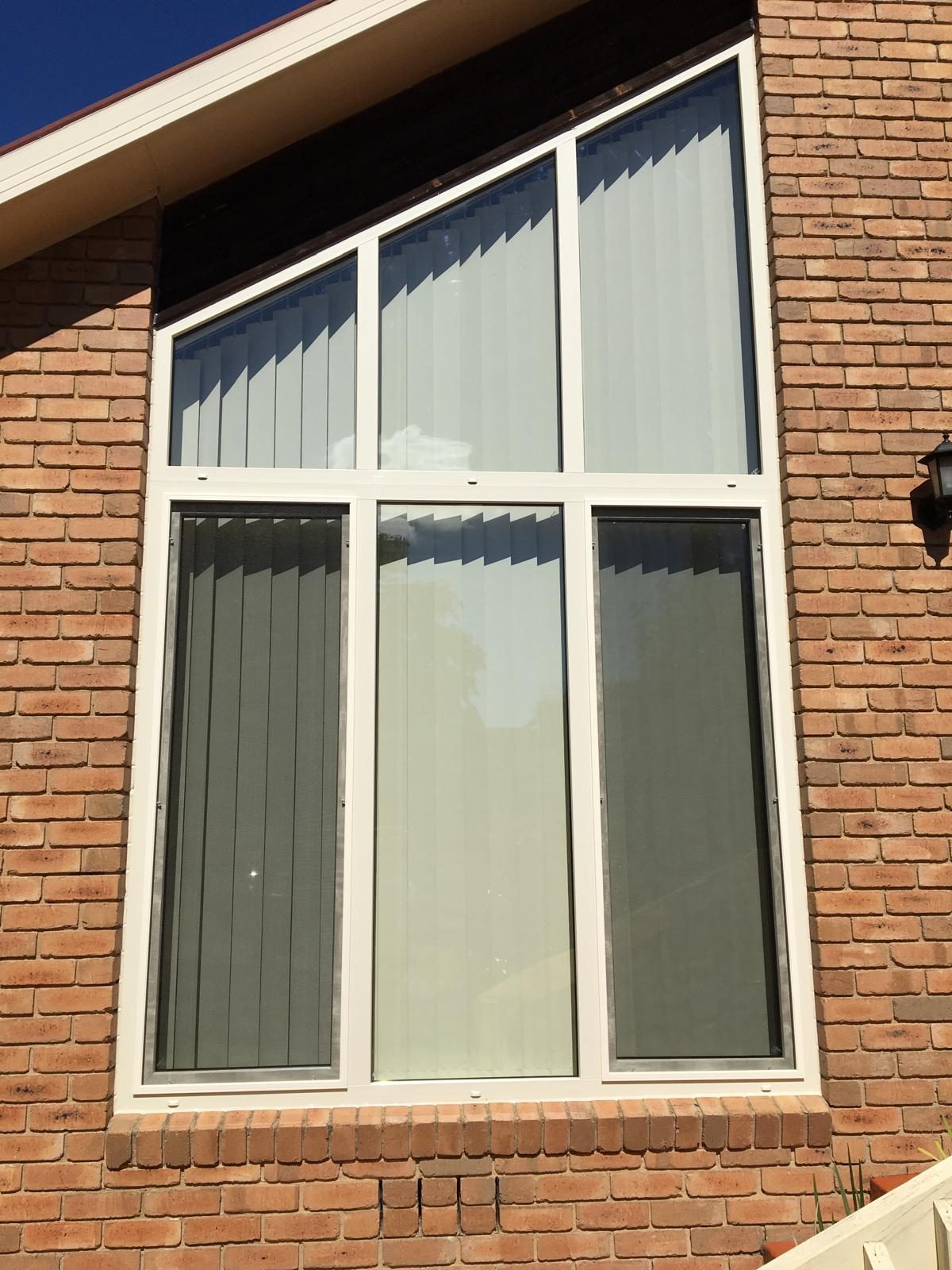Raked window package following the roofline