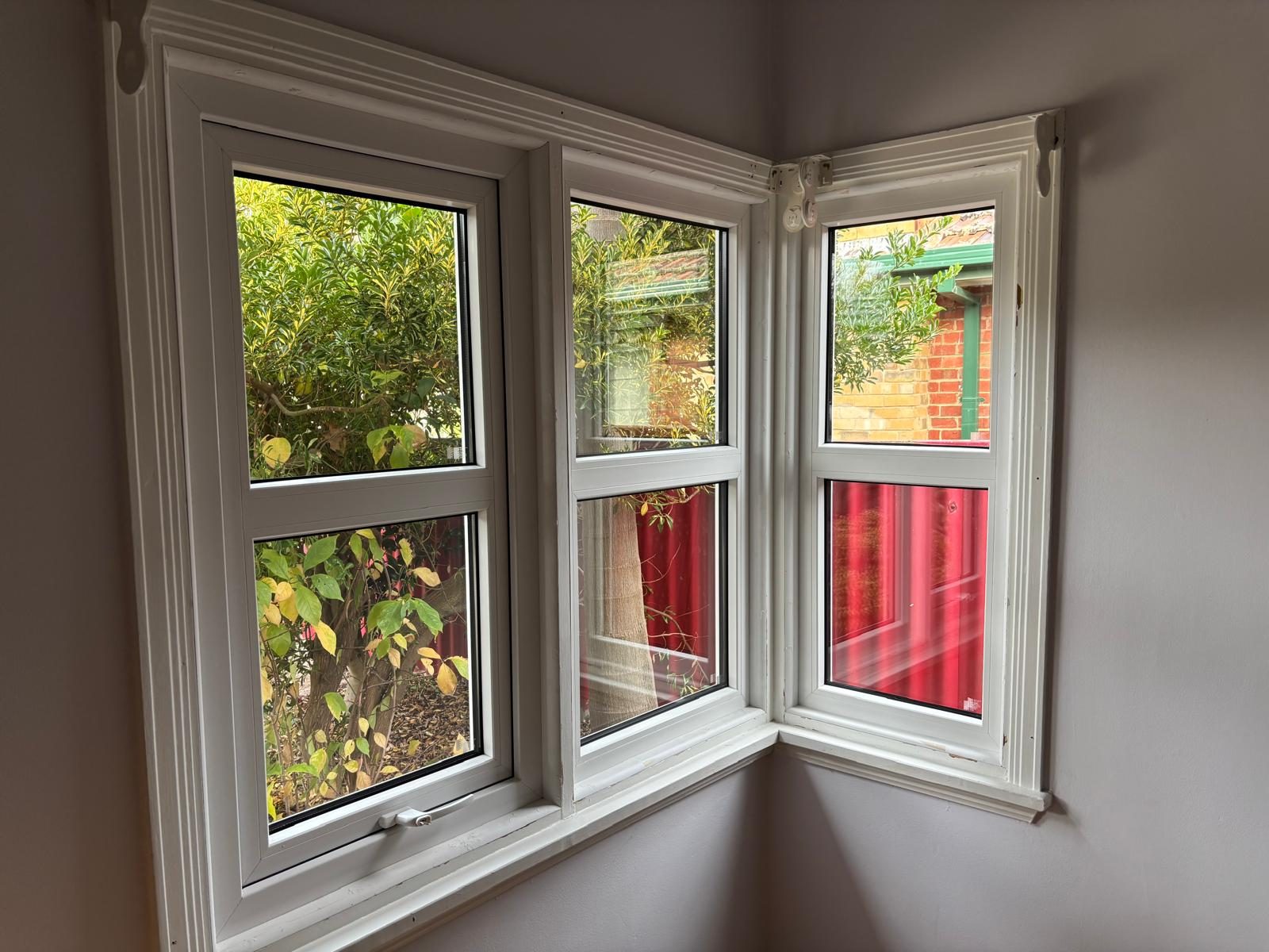 White uPVC corner window seen from inside