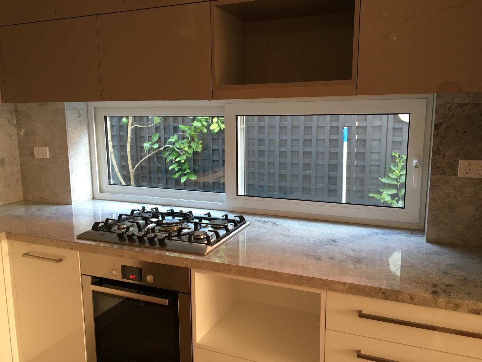 Kitchen splashback window with garden view