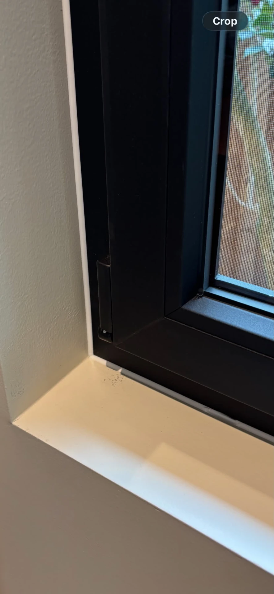 Silicone finish internal finish detail on a double glazed uPVC window