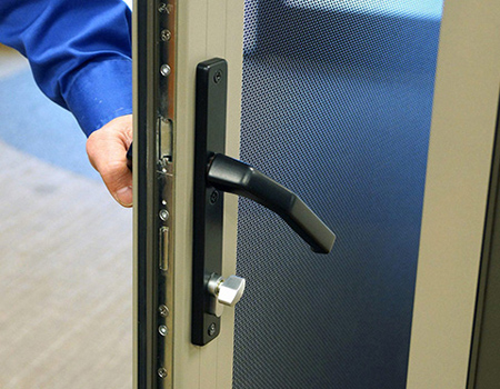 Hinged security screen door with stainless steel mesh