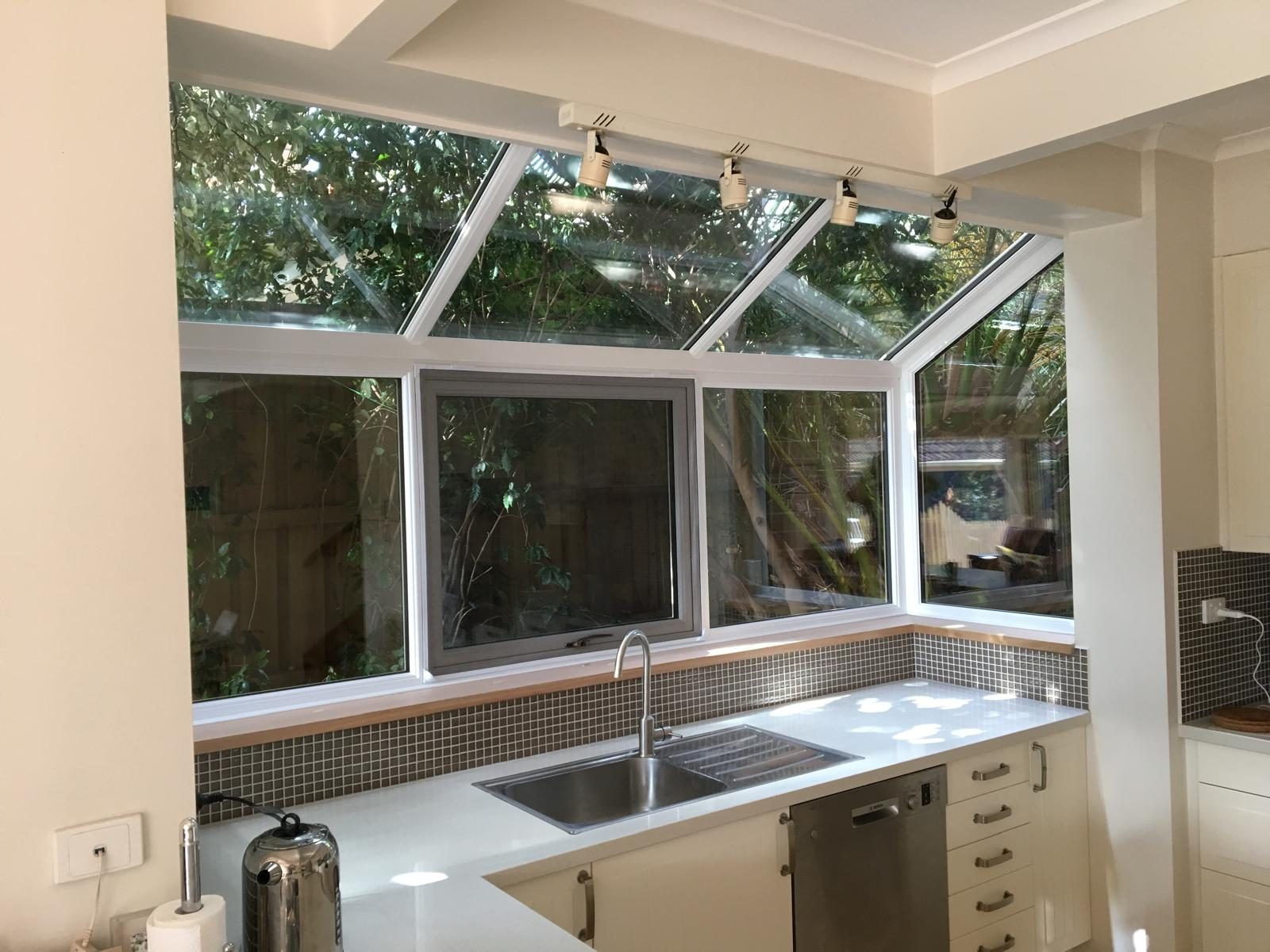 Conservatory style glazed roof over a kitchen