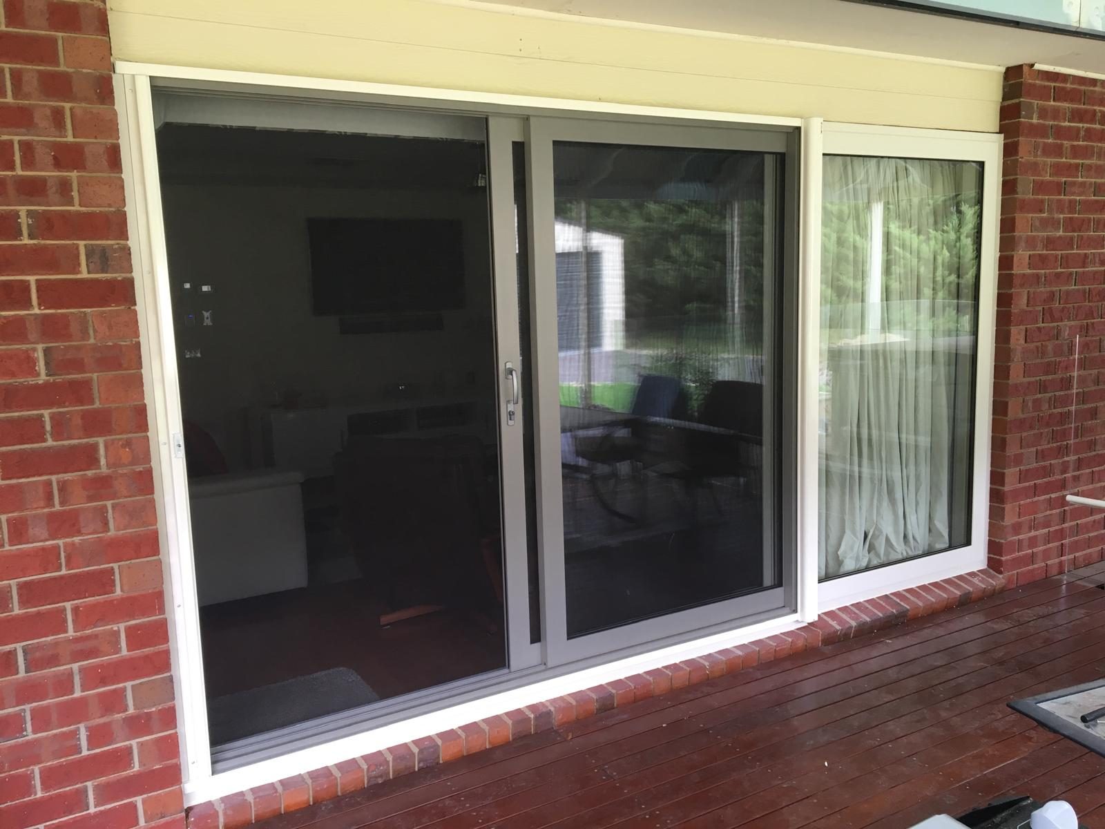 Sliding doors opening a living room to the garden